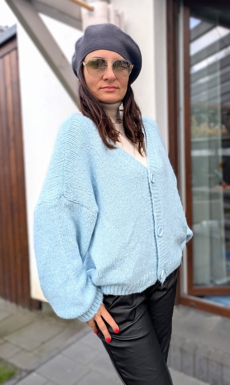 Sweter rozpinany z grafiką na plecach kremowy