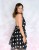 Sukienka letnia w grochy- elegancja w stylu retro czarna